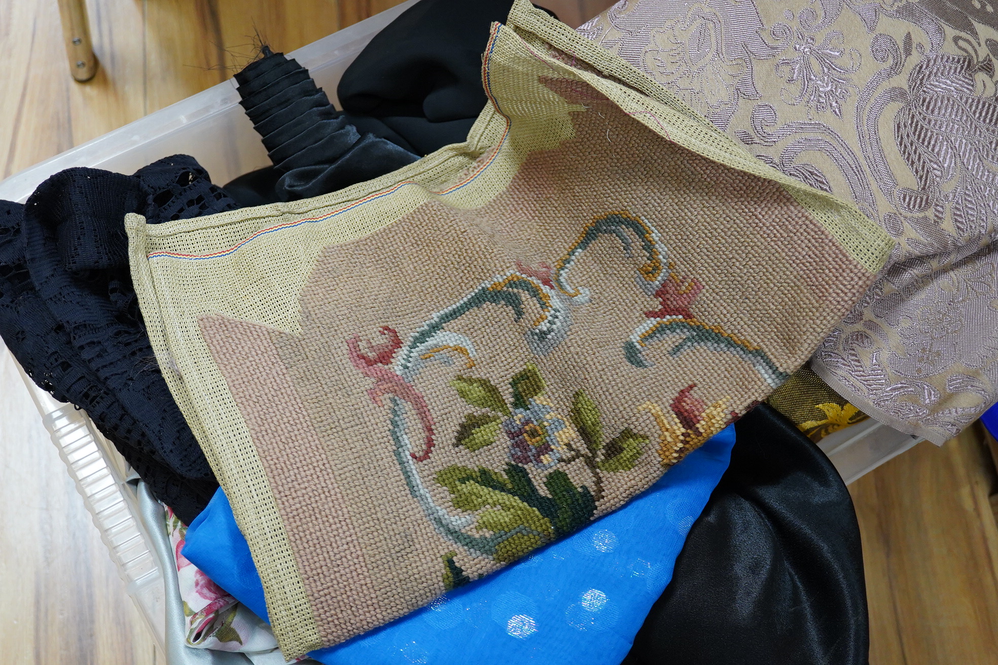 A roll of gold and brown floral curtain fabric, circa 1970-80's and various lengths of silk and other fabrics from 60-70's